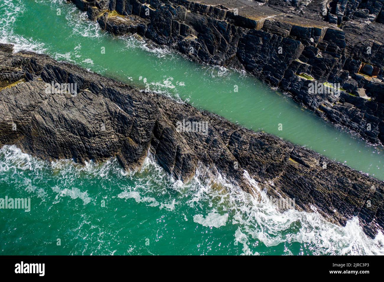 Aerial view of rocks and ocean on the Welsh coastline (Pemrokeshire, Wales) Stock Photo
