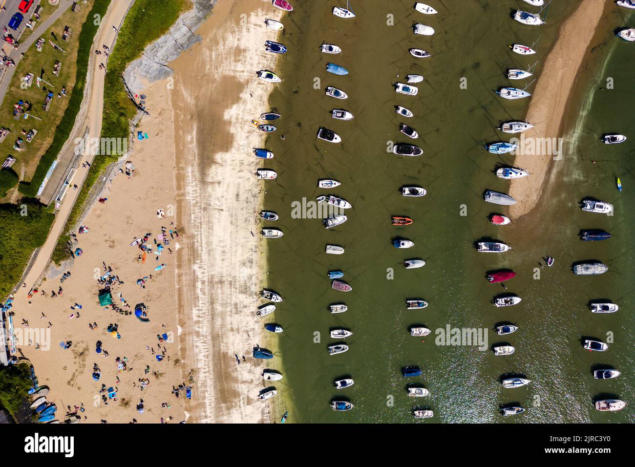 Aerial view of boats in a dry harbour at low tide (New Quay, Ceredigion, Wales) Stock Photo