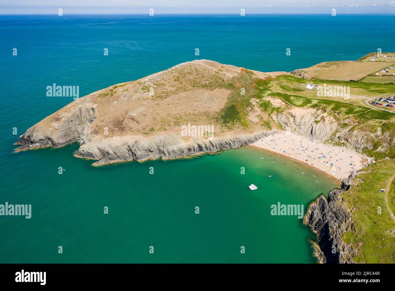 Aerial view of a rocky headland and beautiful sandy beach in West Wales (Mwnt, Ceredigion) Stock Photo