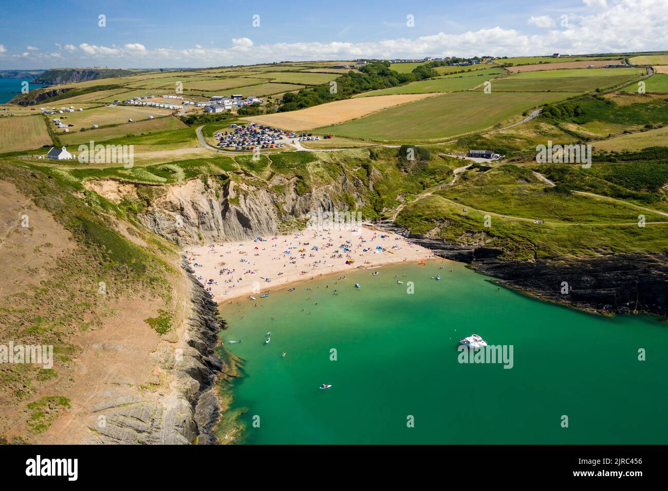 Aerial view of a busy beach and bay in West Wales (Mwnt, Ceredigion) Stock Photo