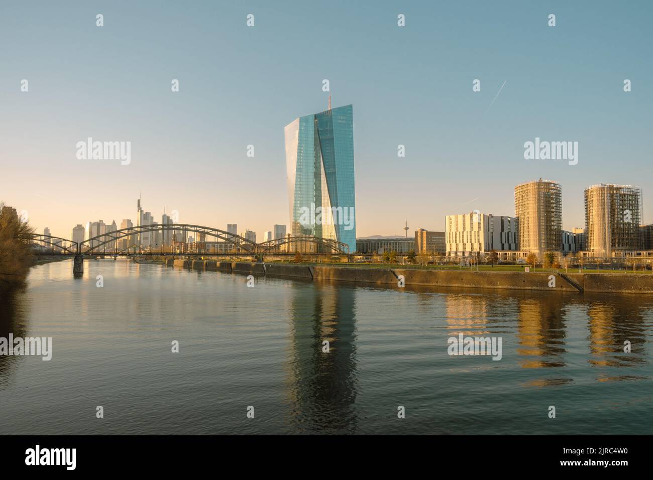 European central bank reflecting on the river main on a beautiful summer evening Stock Photo