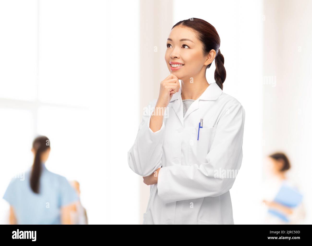 Thoughtful female asian doctor hi-res stock photography and images - Alamy