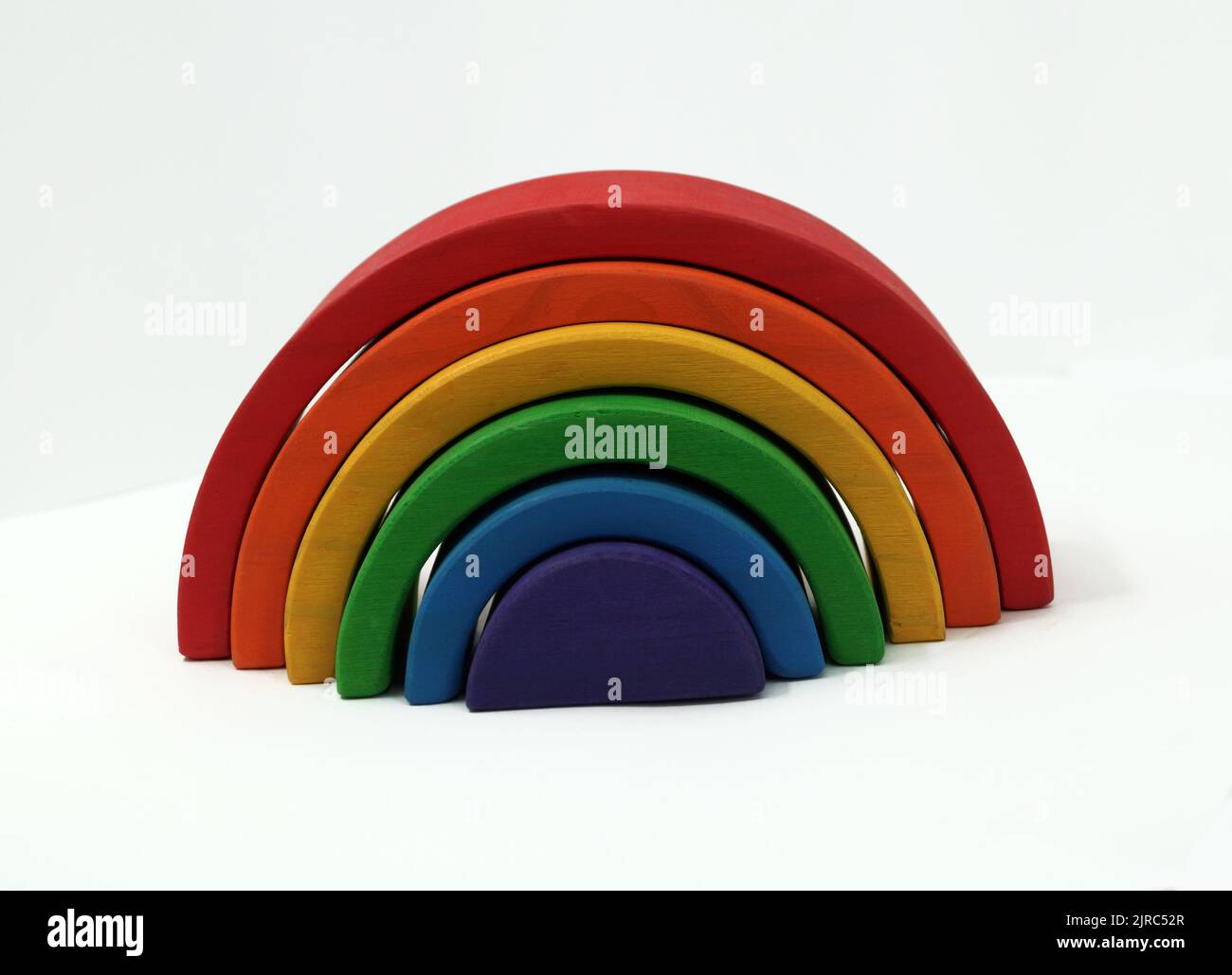 Rainbow coloured arches. A educational toy or puzzle for babies and toddlers Stock Photo