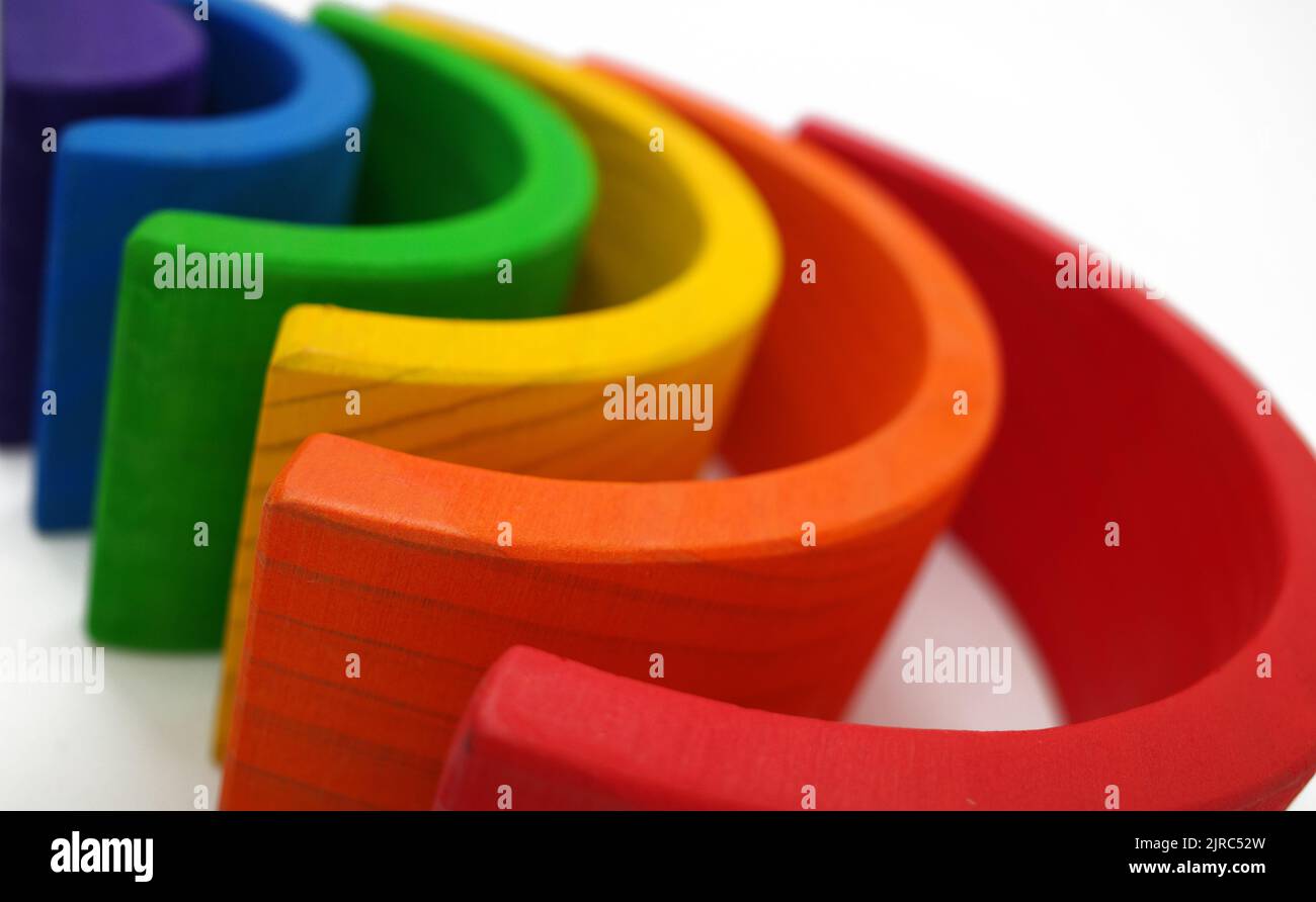 Rainbow coloured arches. A educational toy or puzzle for babies and toddlers Stock Photo