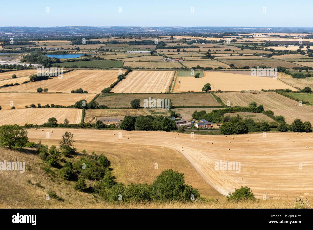 Wiltshire Countryside after prolonged dry weather during the summer heat wave from the top of Westbury White Horse,  Westbury, Wiltshire, England, UK Stock Photo