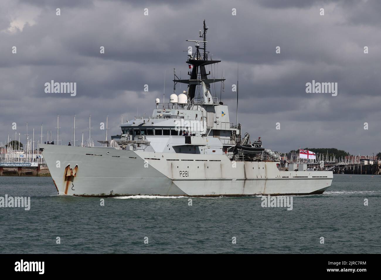The Royal Navy River class offshore patrol vessel HMS TYNE heads out of harbour Stock Photo