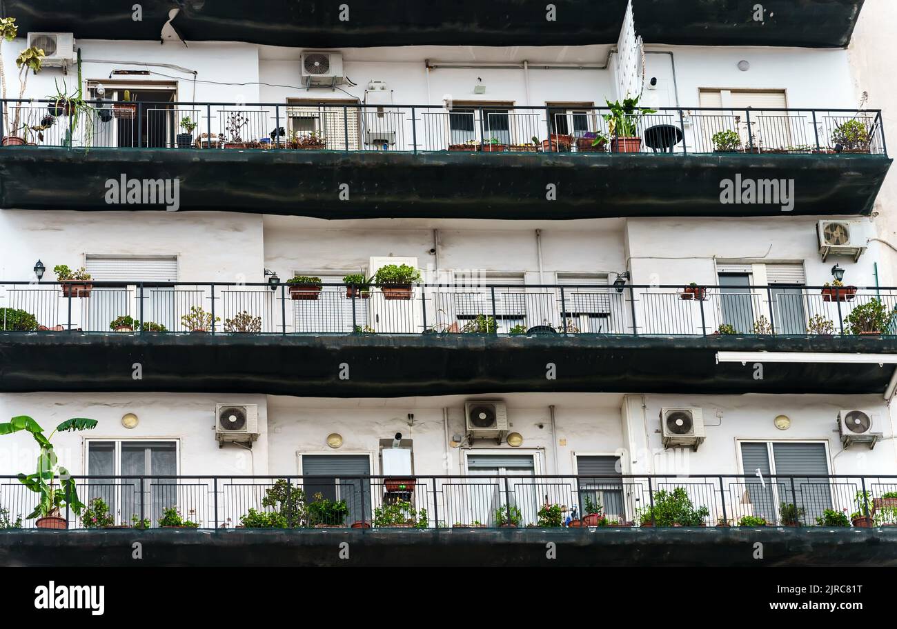 Italian apartment building with balconies and windows Stock Photo Alamy