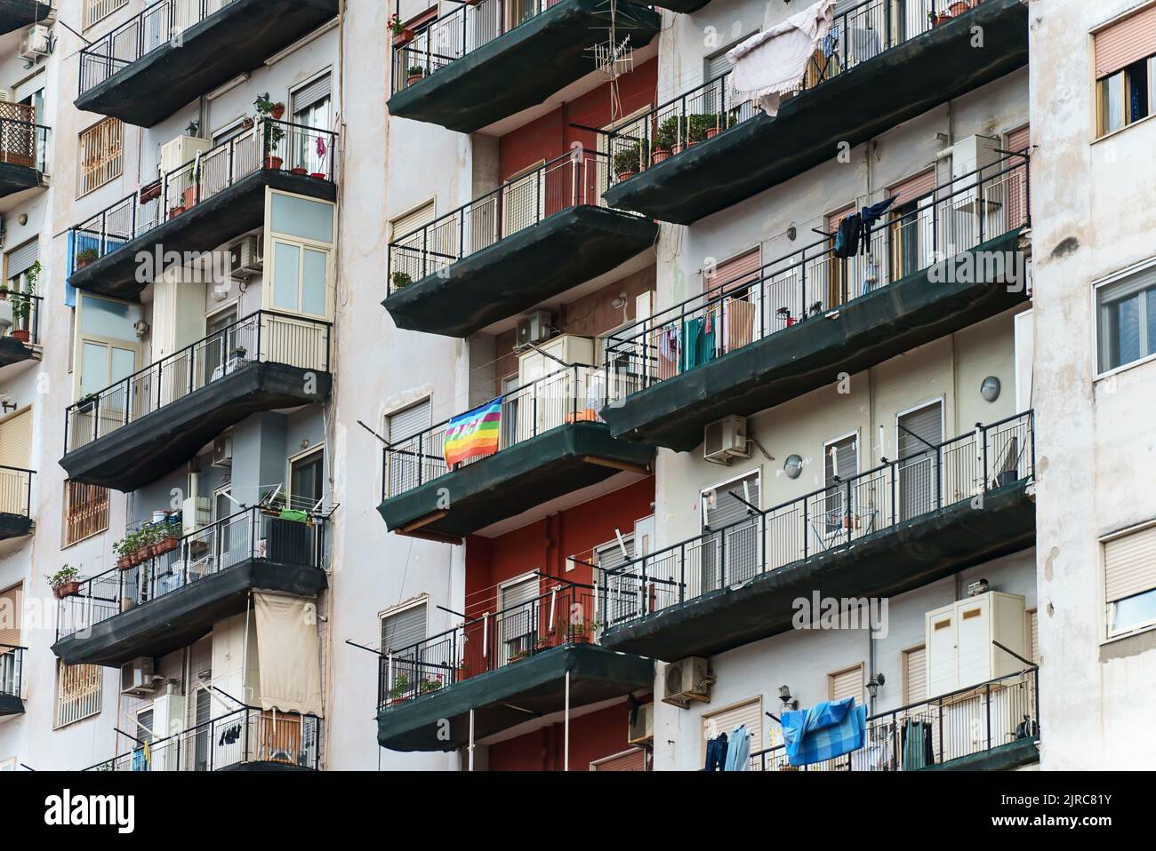 Italian apartment building with balconies and windows Stock Photo Alamy