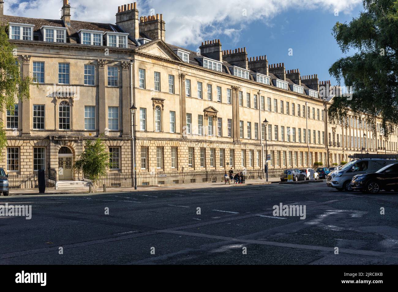 Great Pulteney Street and its sunlit terrace Georgian period townhouses, City of Bath, Somerset, England, UK Stock Photo