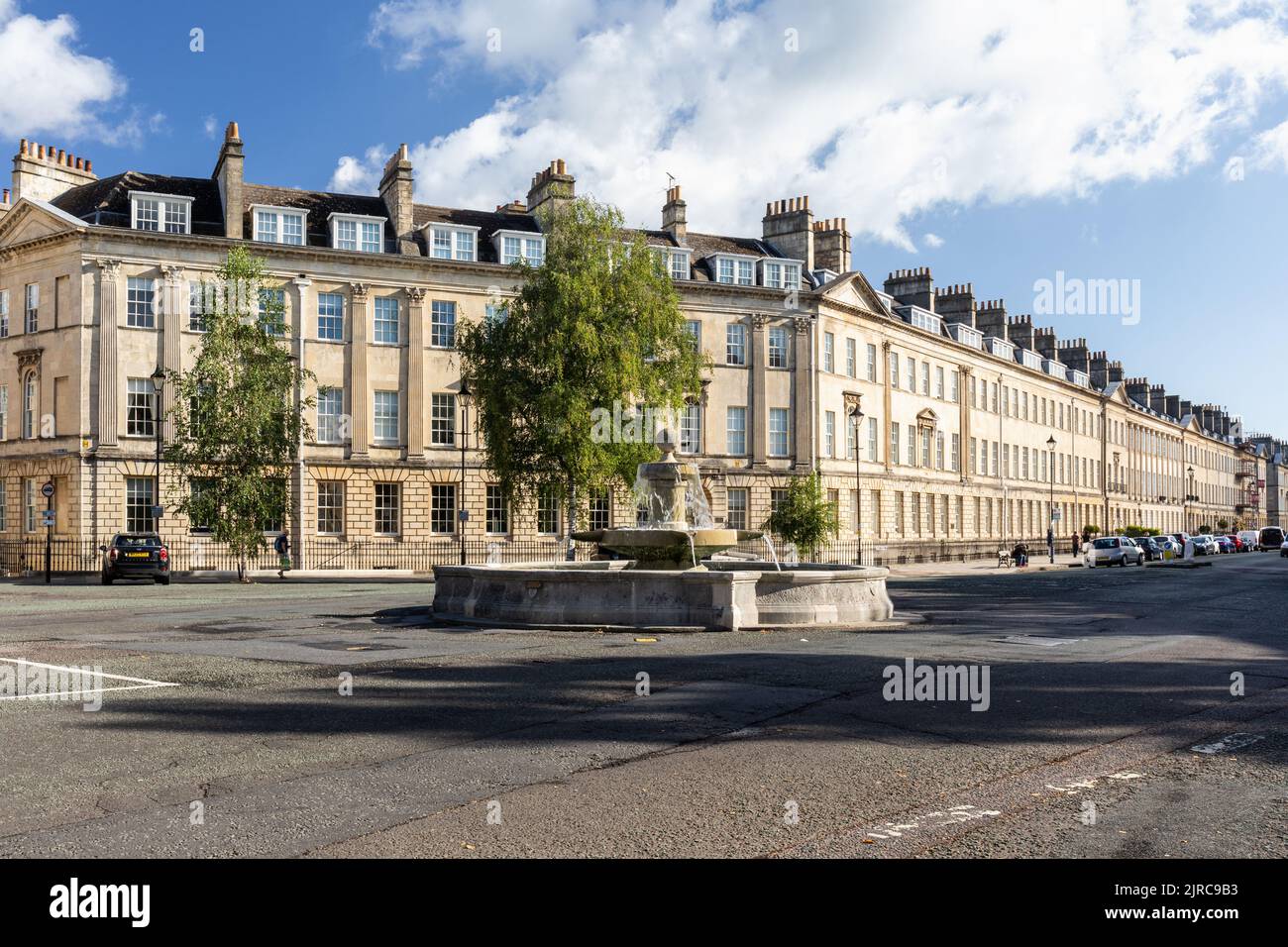 The Laura Place Fountain at the end of Great Pulteney Street and its terrace Georgian period townhouses, City of Bath, Somerset, England, UK Stock Photo