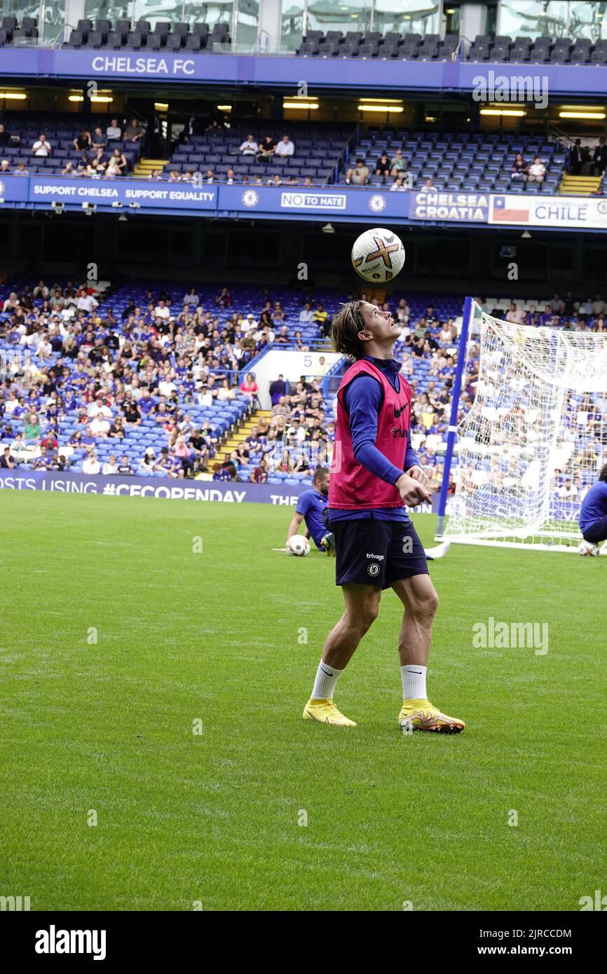 Fulham, London, UK. 23rd Aug, 2022. Chelsea Football Club first team players train at their home ground, Stamford Bridge, in front of fans at an 'Open Day training' session. Connor Gallagher doing 'keepie uppies' Credit: Motofoto/Alamy Live News Stock Photo