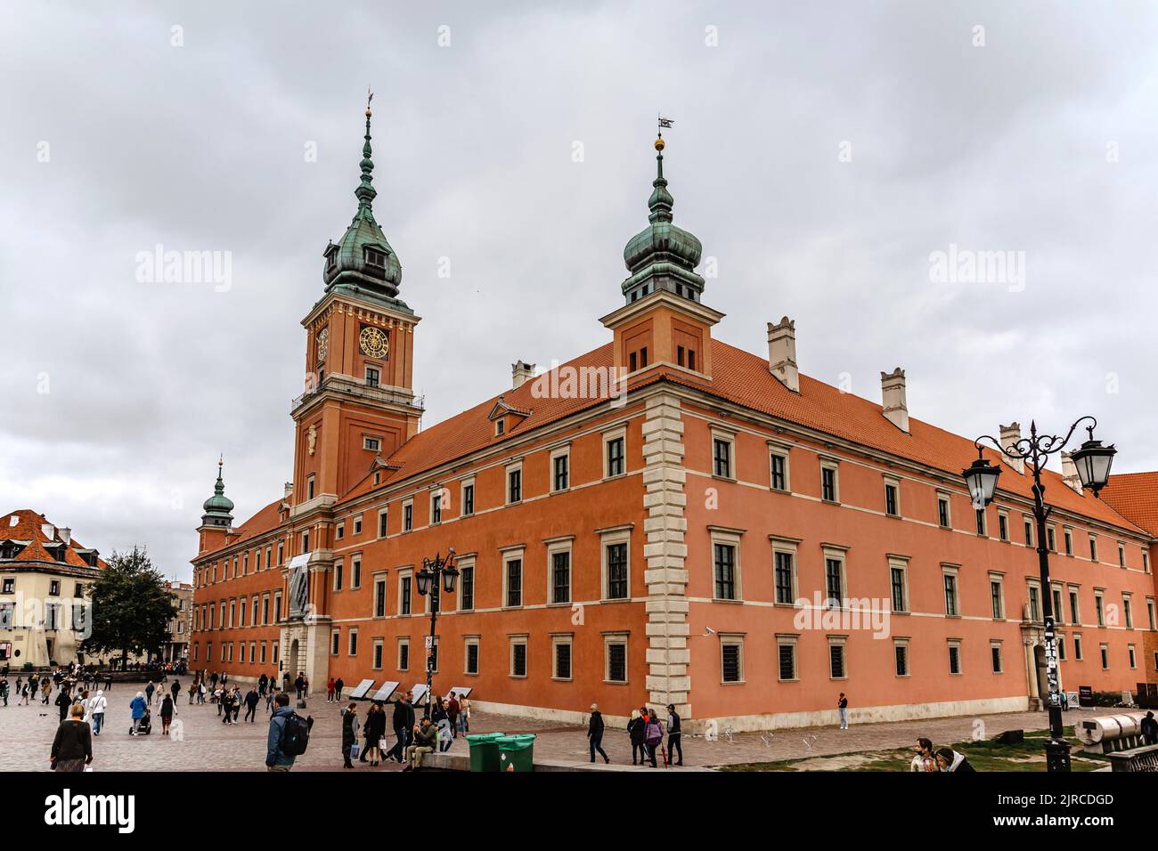 Warsaw,Poland-September 18,2021.The Royal Castle with Sigismund tower situated in Castle Square,entrance to Old Town,facade built of bricks.Polish Stock Photo