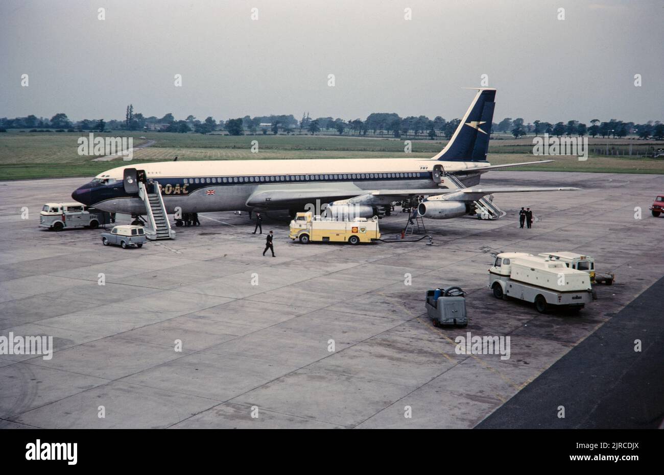 A BOAC Cunard Boeing 707 Jet Airliner, registration G-APFO at Manchester International Airport in England on 1st July 1965. Stock Photo