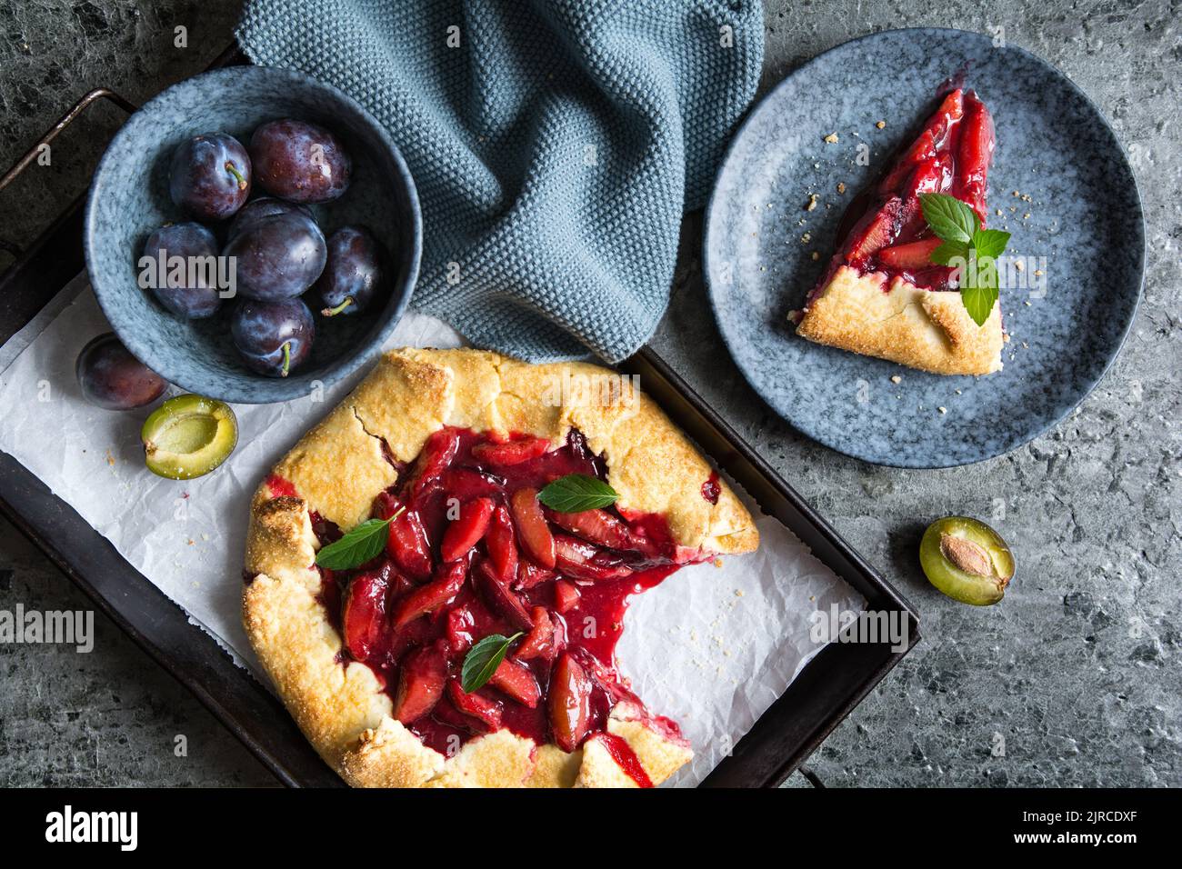 Traditional juicy French Galette pie filled with plums Stock Photo - Alamy