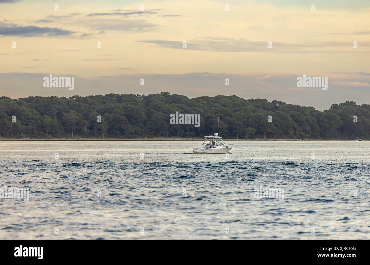 Fishing boat, Amazing Grace plying the waters off Shelter Island, NY Stock Photo