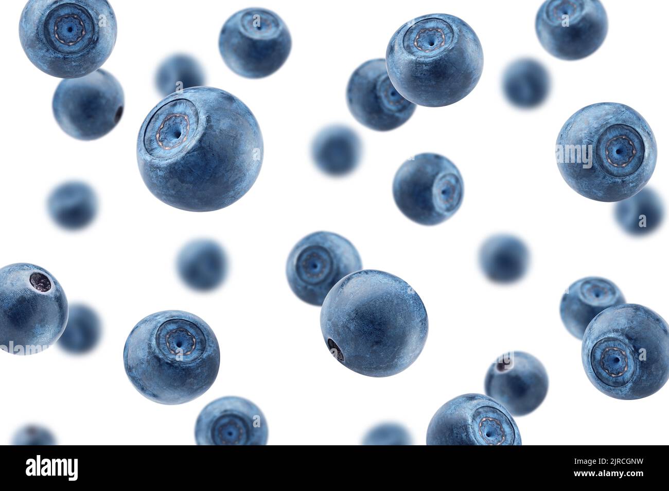 Falling blueberry, isolated on white background, selective focus Stock Photo