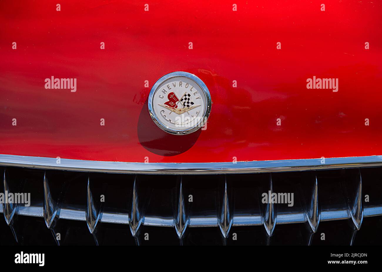 The front of a restored antique Chevrolet sedan at an antique auto show and parade on Cape Cod, USA Stock Photo