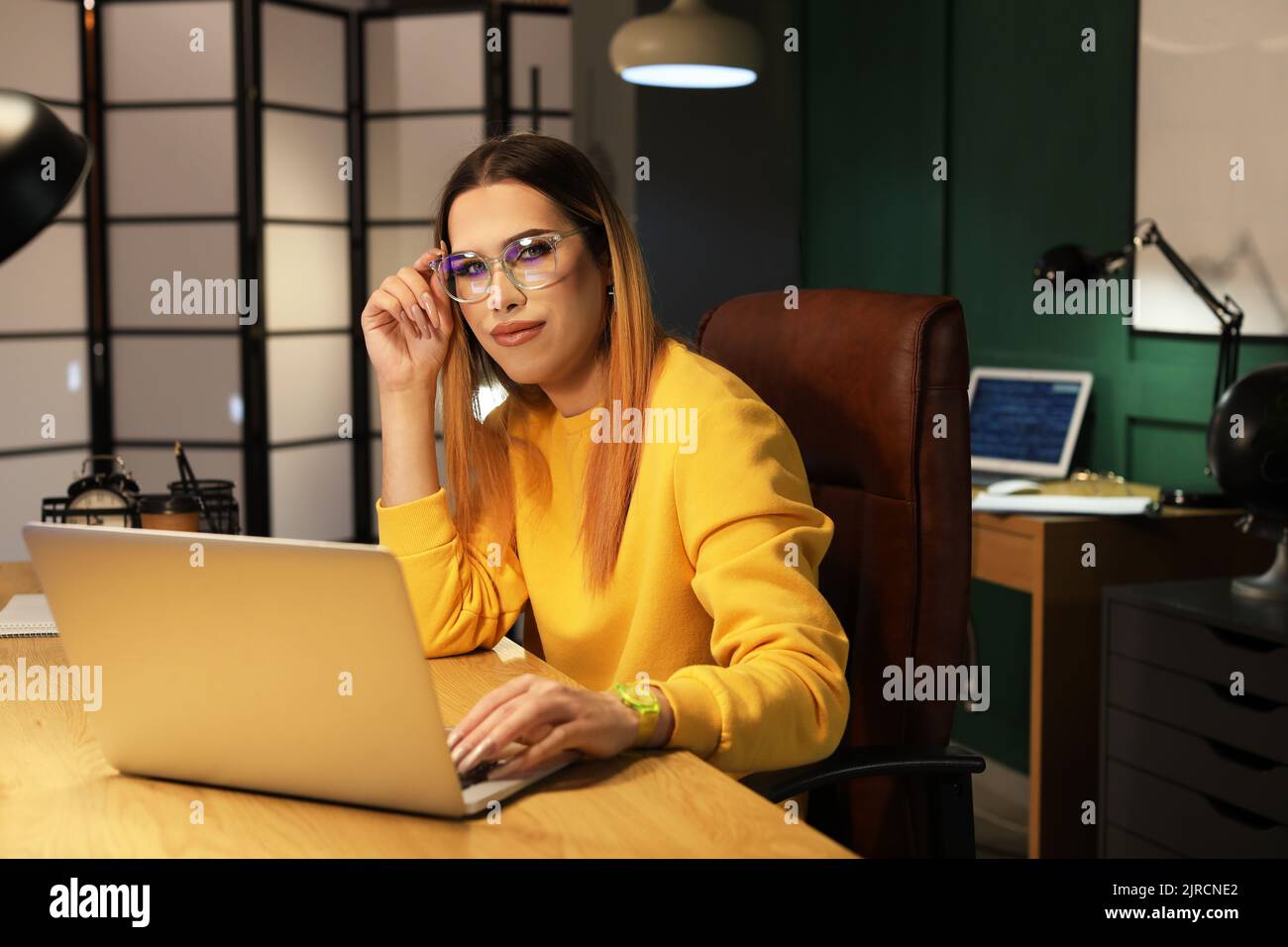 Transgender programmer working in server room Stock Photo
