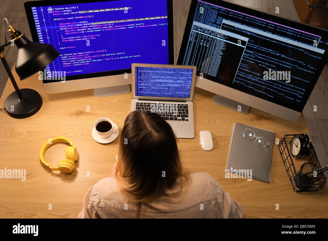 Transgender programmer working in server room Stock Photo - Alamy