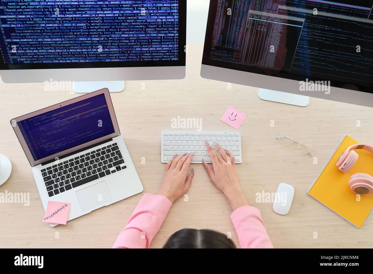 Transgender programmer working in office Stock Photo - Alamy