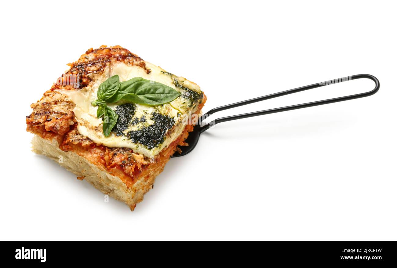 Spatula with piece of tasty Italian pie on white background Stock Photo