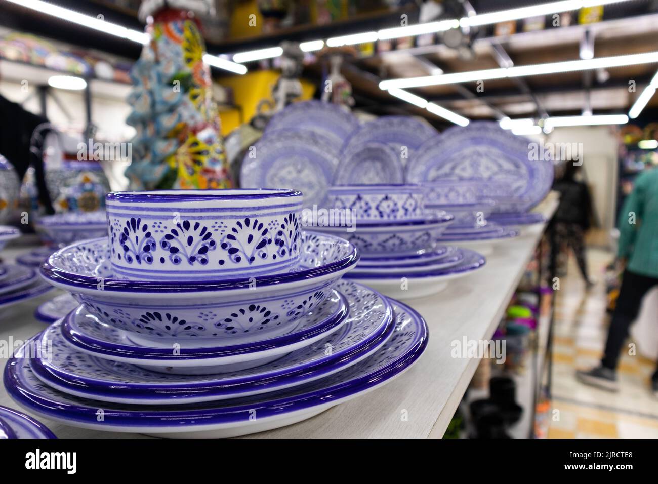 traditional mexican talvaera ceramica colorful pottery dishes porcaleain plates in a traditional market store in puebla city Stock Photo