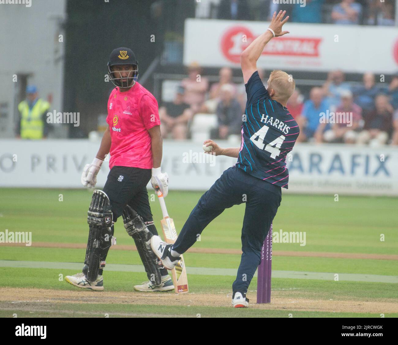 Max Harris bowls against Sussex in a 50 over cup game. Stock Photo