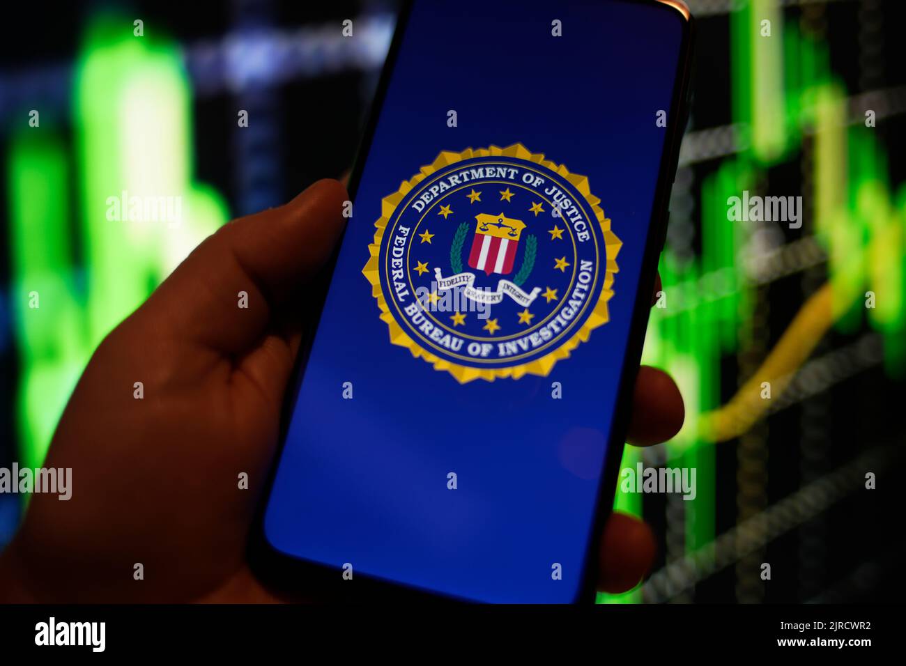 The FBI (Federal Bureau of Investigation) logo is seen on a Redmi phone screen in this photo illustration in Warsaw, Poland on 23 August, 2022. Stock Photo
