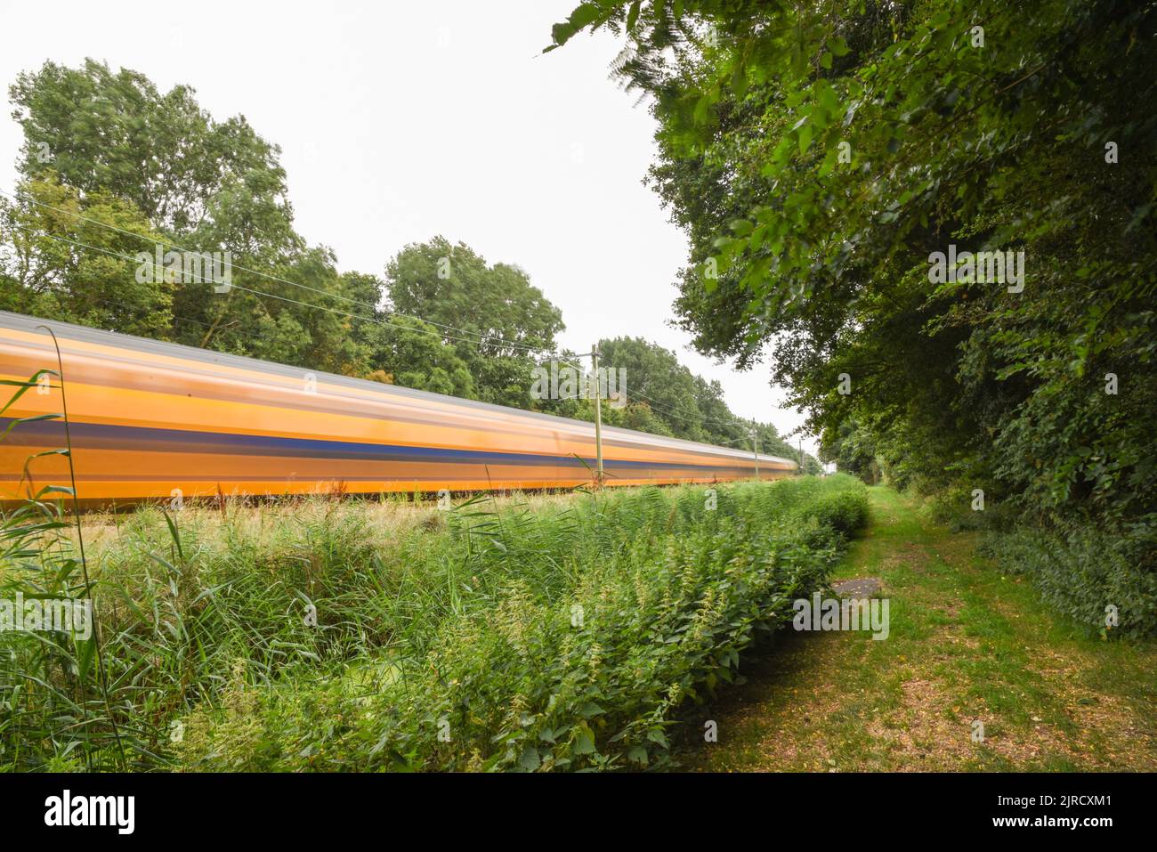 Den Helder, Netherlands. August 2022. Long exposure shoot of passing train. High quality photo Stock Photo
