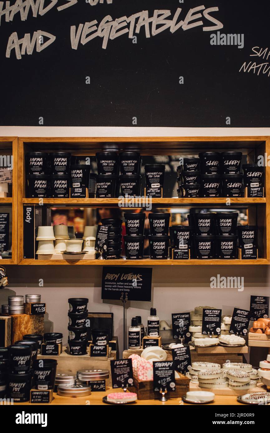 retail shelves with cosmetics, bath products at Lush store Stock Photo