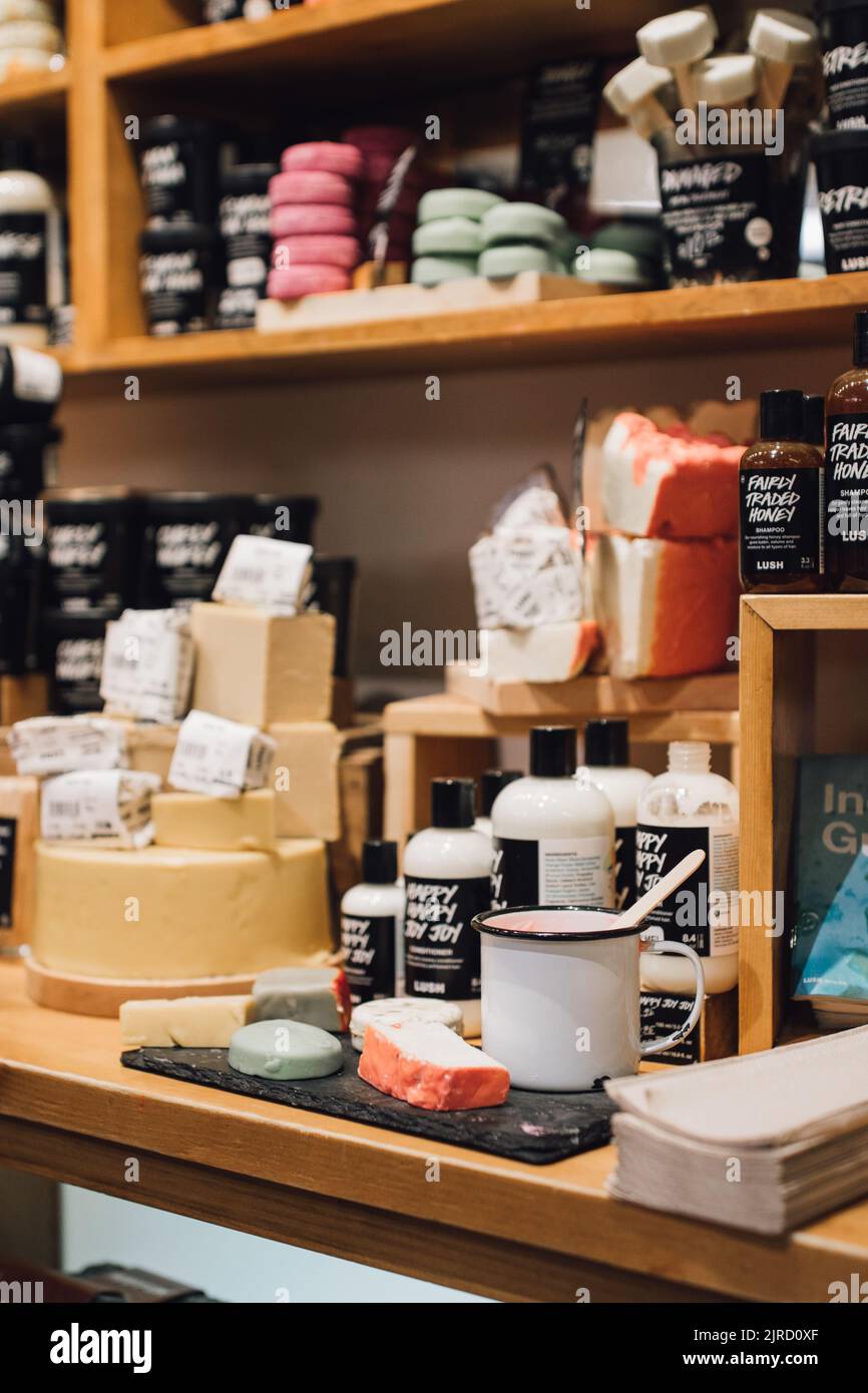 retail shelves with cosmetics, bath products at Lush store Stock Photo