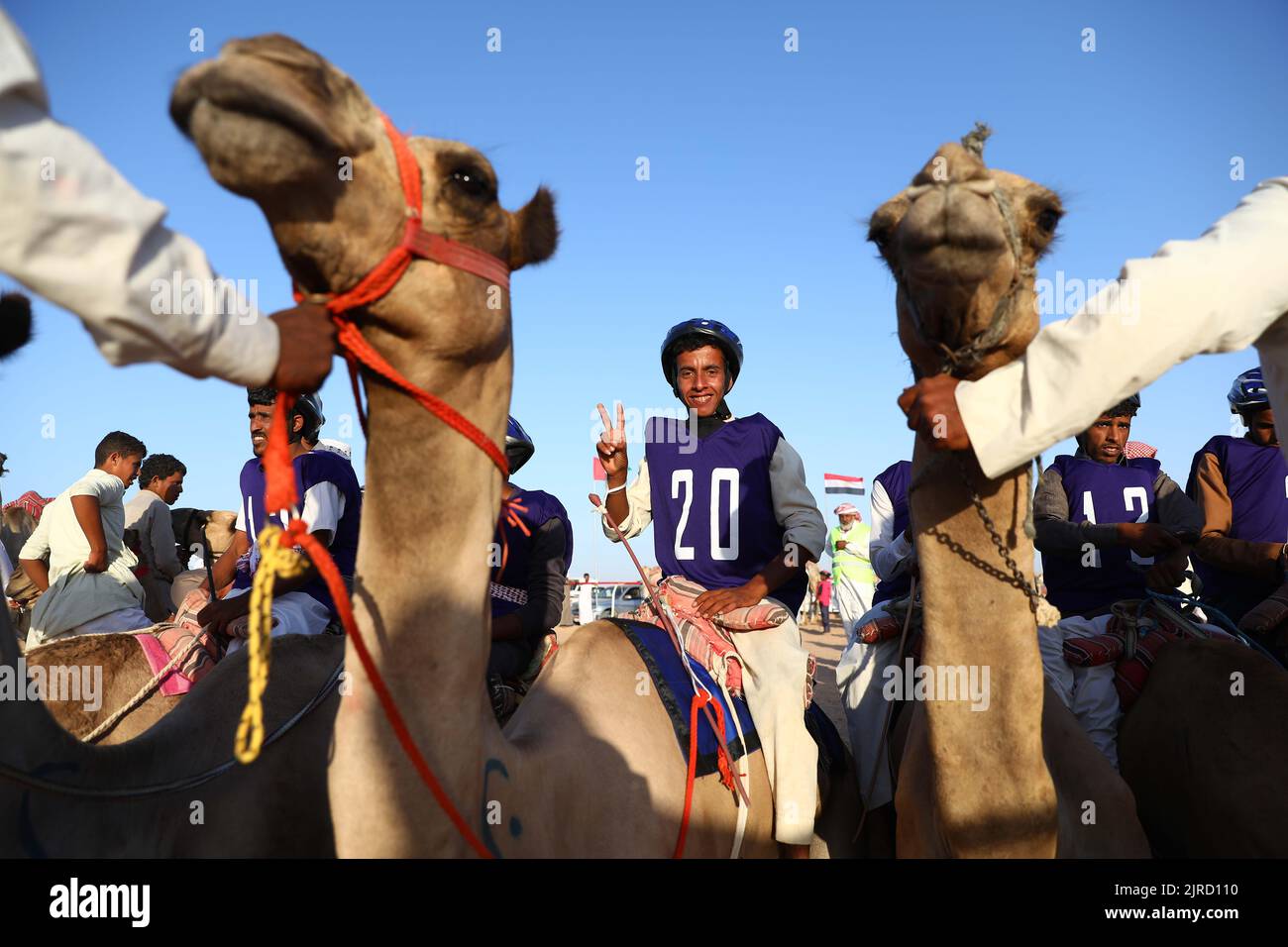 El Alamein City, Egypt. 23rd Aug, 2022. A participant poses for photos ...