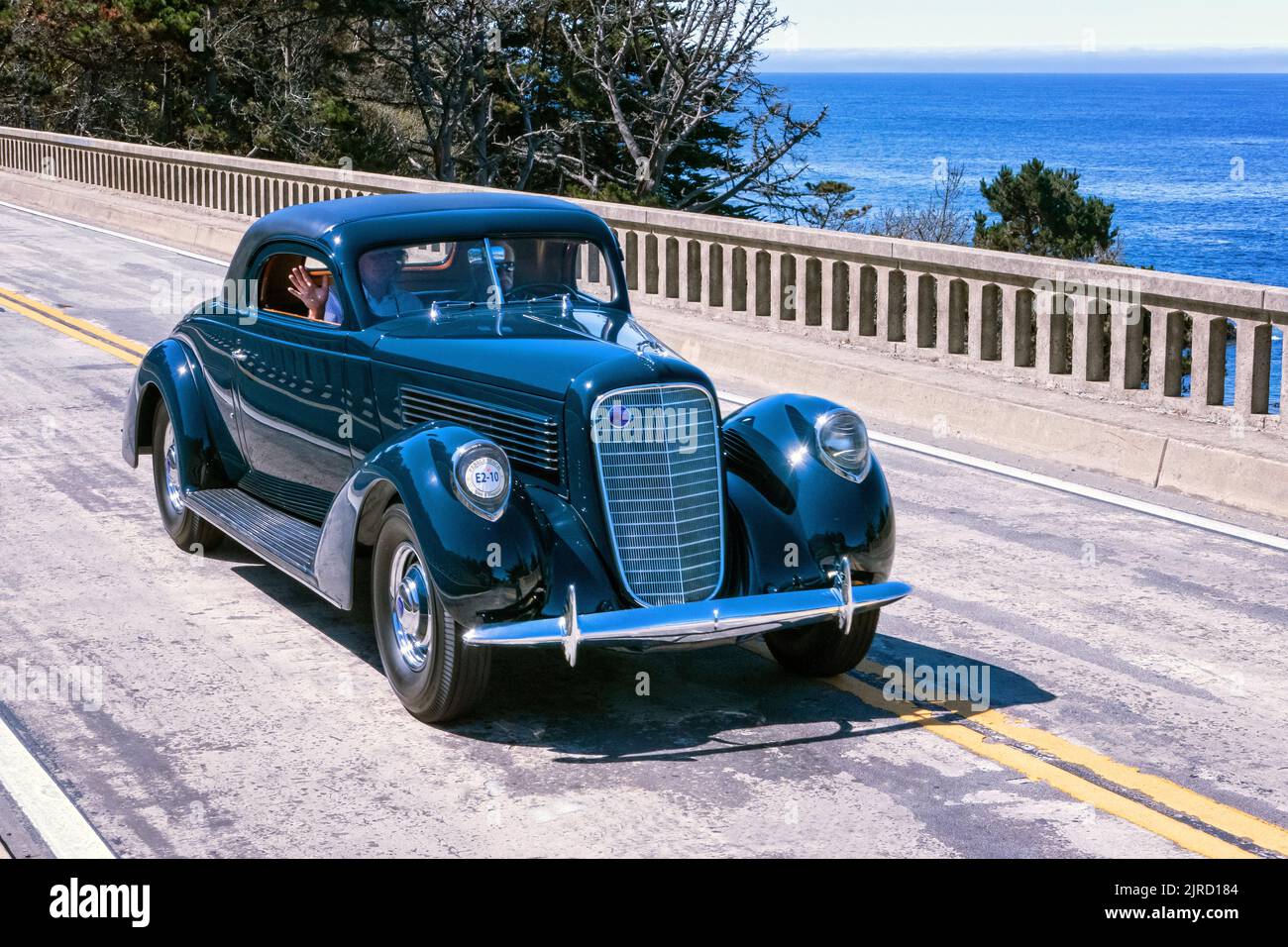 1938 Lincoln K LeBaron Coupe driving the Pebble Beach concours tour on HWY1 California USA Stock Photo