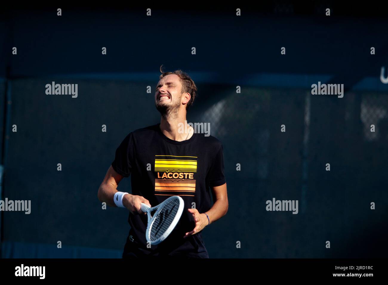 Flushing Meadows, New York, USA. 23rd Aug, 2022. World Number one Daniil Medvedev of Russia grimaces after missing a shot while practicing today for the U.S. Open at the National Tennis Center in Flushing Meadows, New York. The tournament begins next Monday. Credit: Adam Stoltman/Alamy Live News Stock Photo