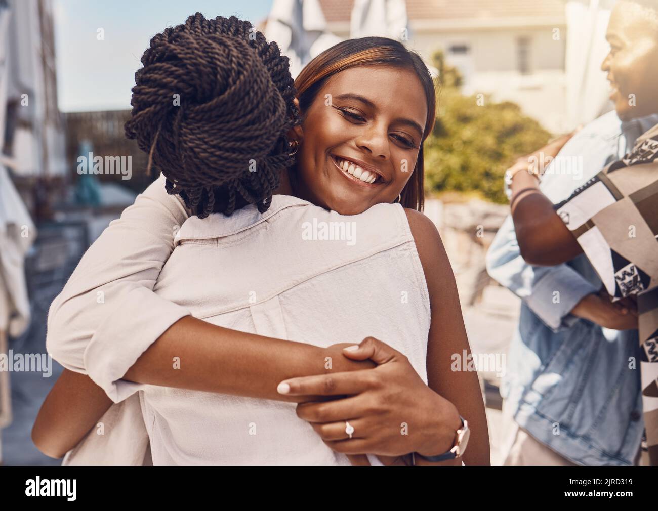 Girl friend, friends and happy hug of women with a smile hugging with happiness and love. Young female adult friendship of university students showing Stock Photo