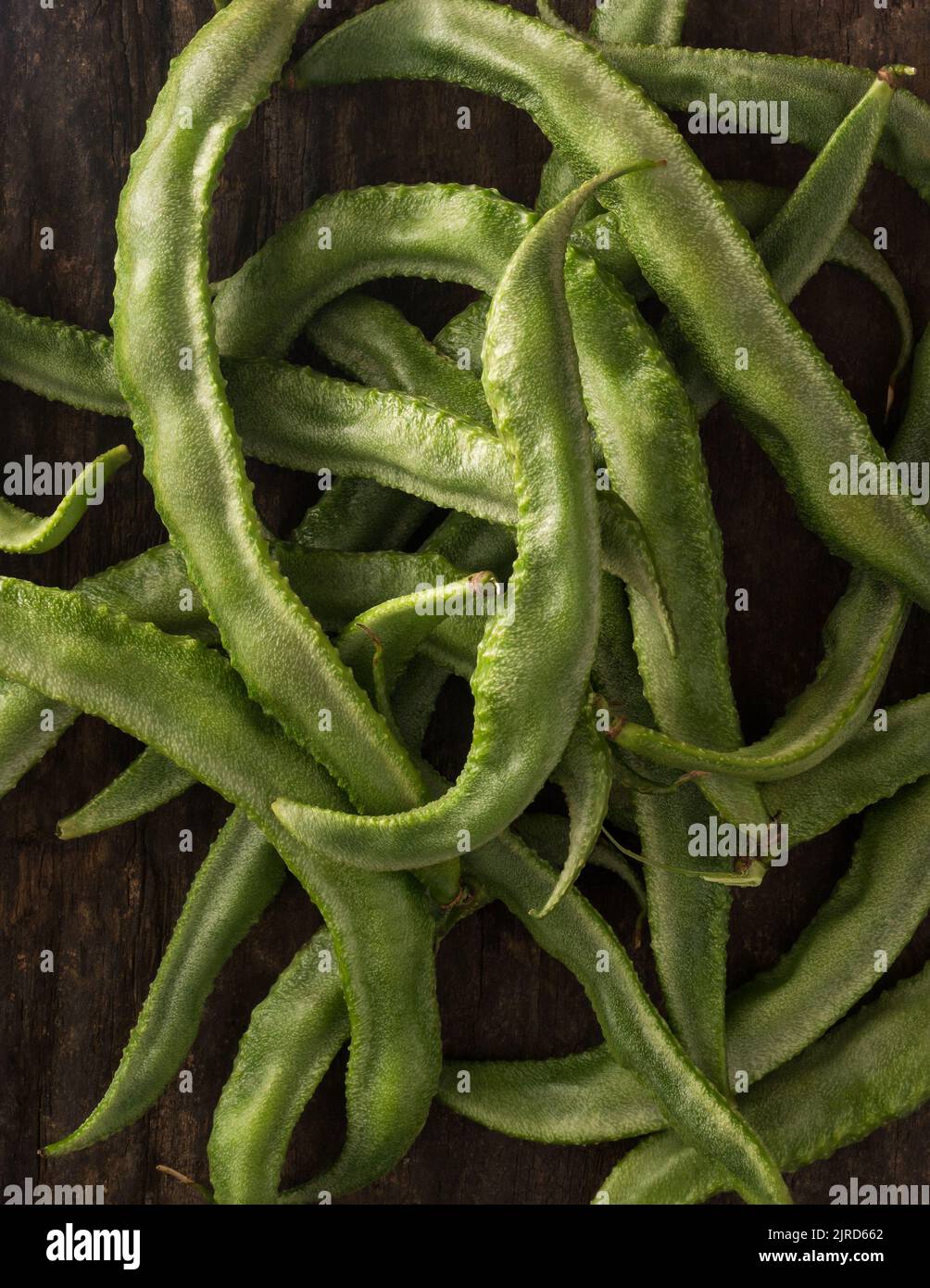 heap of hyacinth bean, lablab purpureus, also known as valor papdi beans, full frame view of indian vegetable, taken straight from above Stock Photo