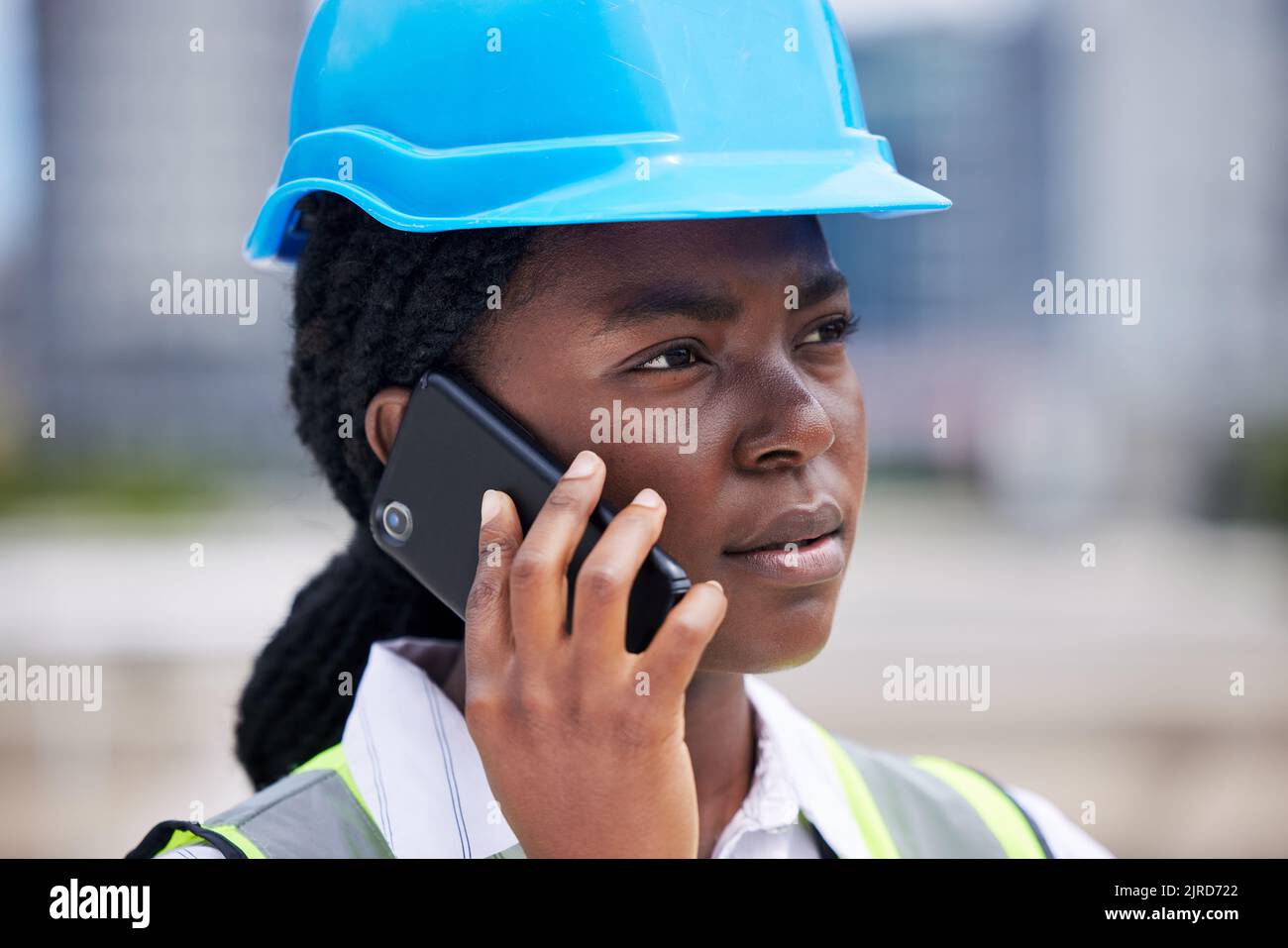 Architect Engineer On A Phone Call Conversation At A Construction Site architect-engineer-on-a-phone-call-conversation-at-a-construction-site