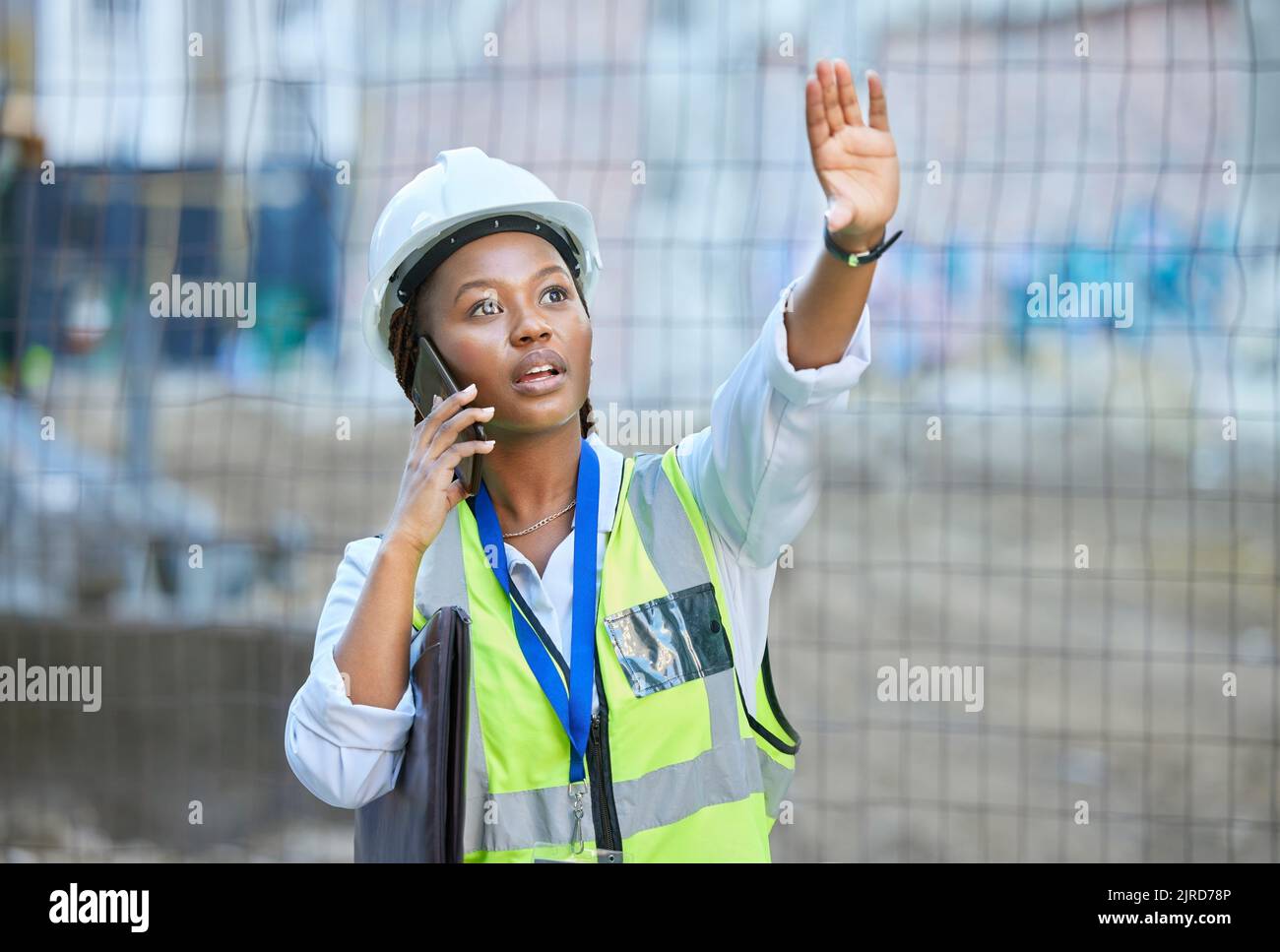 Construction worker, maintenance and development woman multitask on a ...