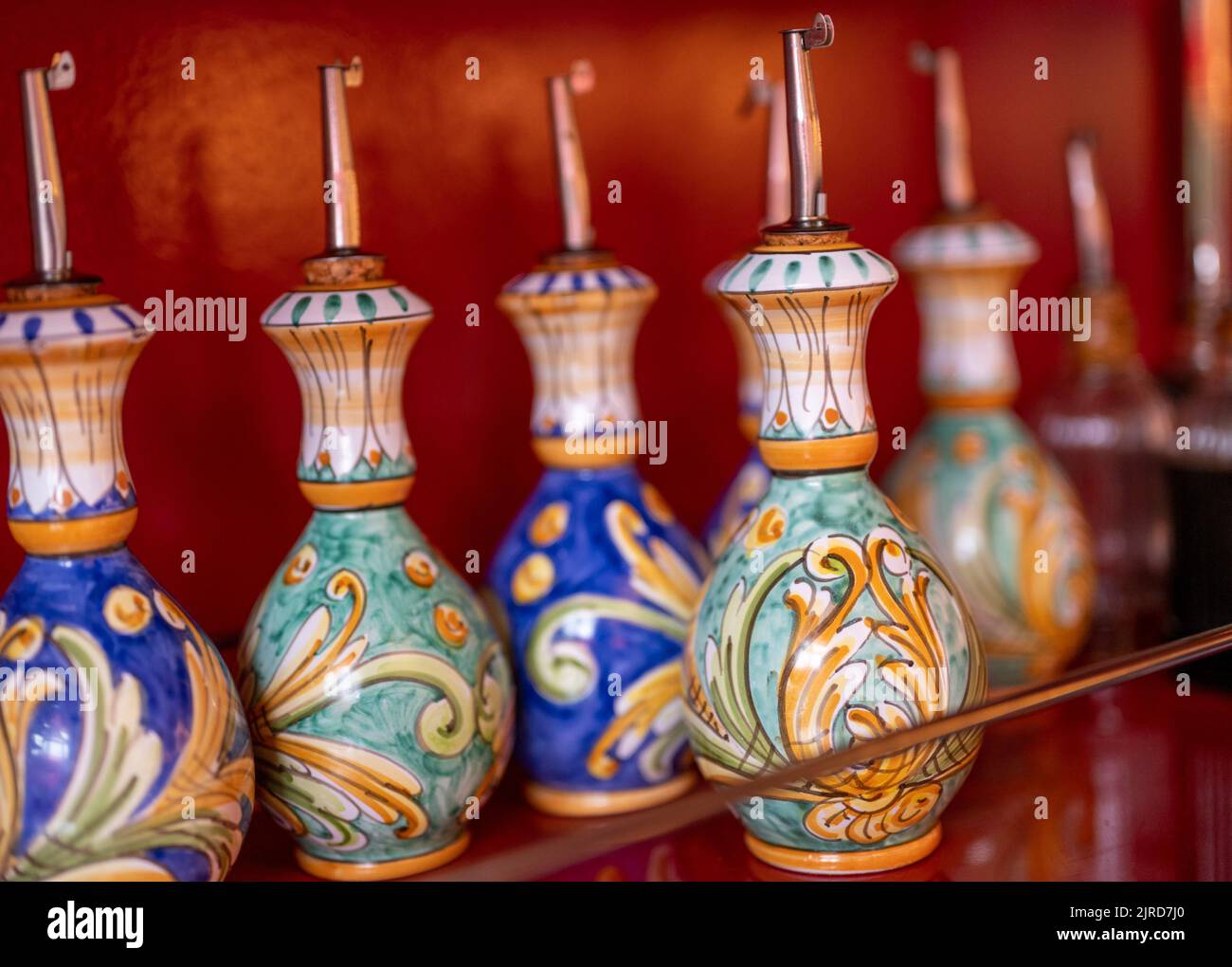 Berlin, Germany. 19th Aug, 2022. Decorative oil containers stand in the dining room of the 'Coccodrillo' restaurant in Weinbergspark. The main thing 'Instagrammable' seems to be the motto of some new eateries. Credit: Monika Skolimowska/dpa/Alamy Live News Stock Photo