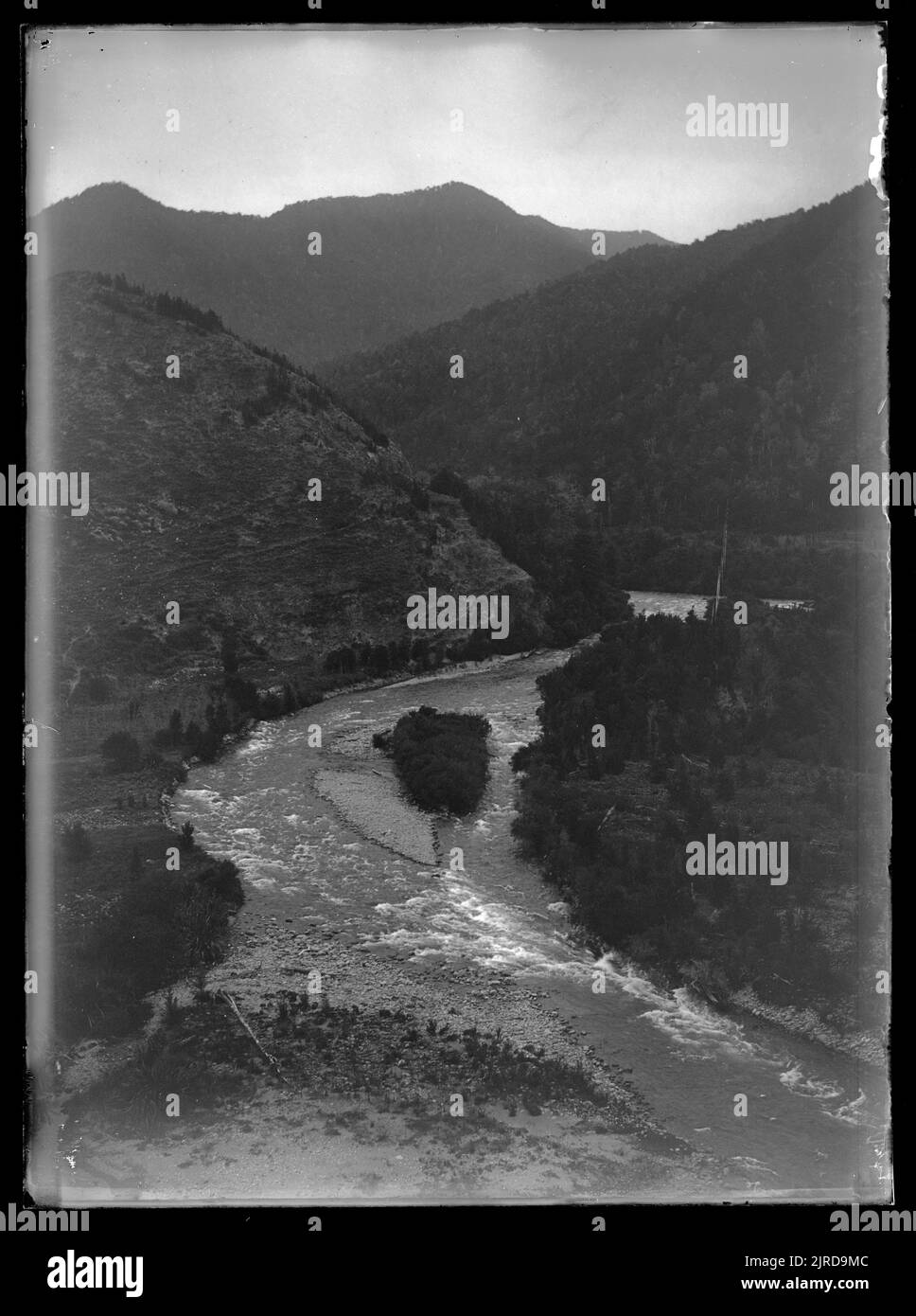 The Gowan River from its junction with the Buller. This tributary rises in the alpine Lake Rotoroa., February 1912, South Island, by Leslie Adkin. Stock Photo