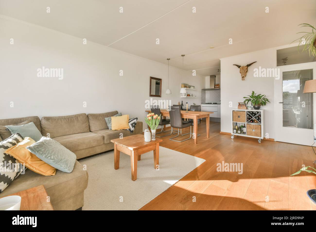 Interior of contemporary living room with comfortable sofa and wooden ...