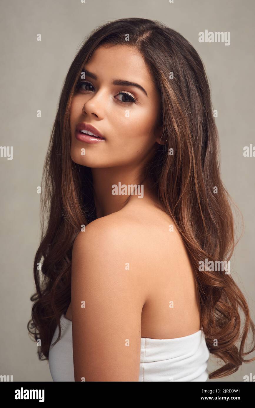 Let your hair flow and let your skin glow. Studio shot of a young