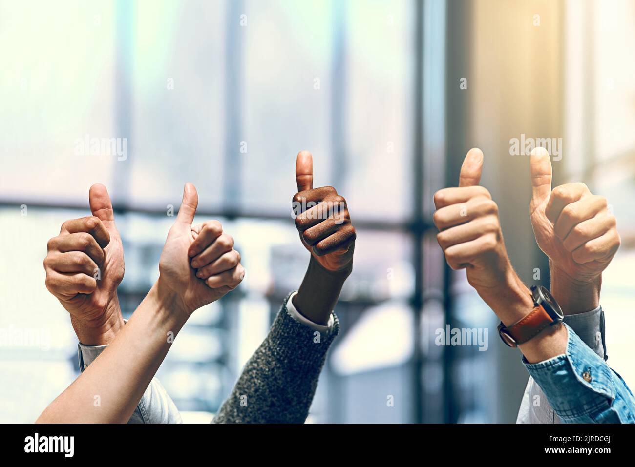Diverse hands thumbs up hi-res stock photography and images - Alamy