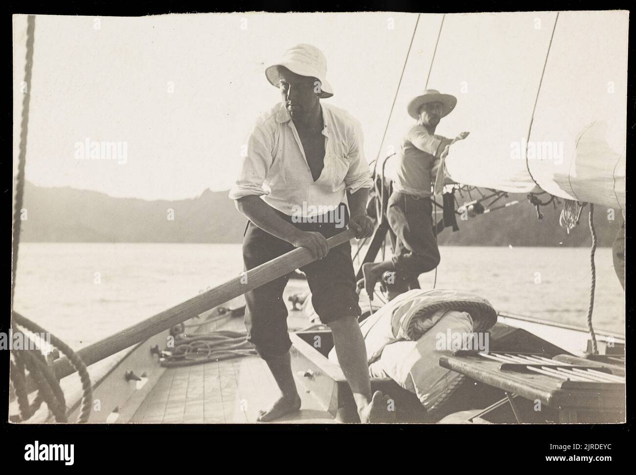 Two men sailing, early 20th century, Auckland, by Henry Winkelmann. Stock Photo