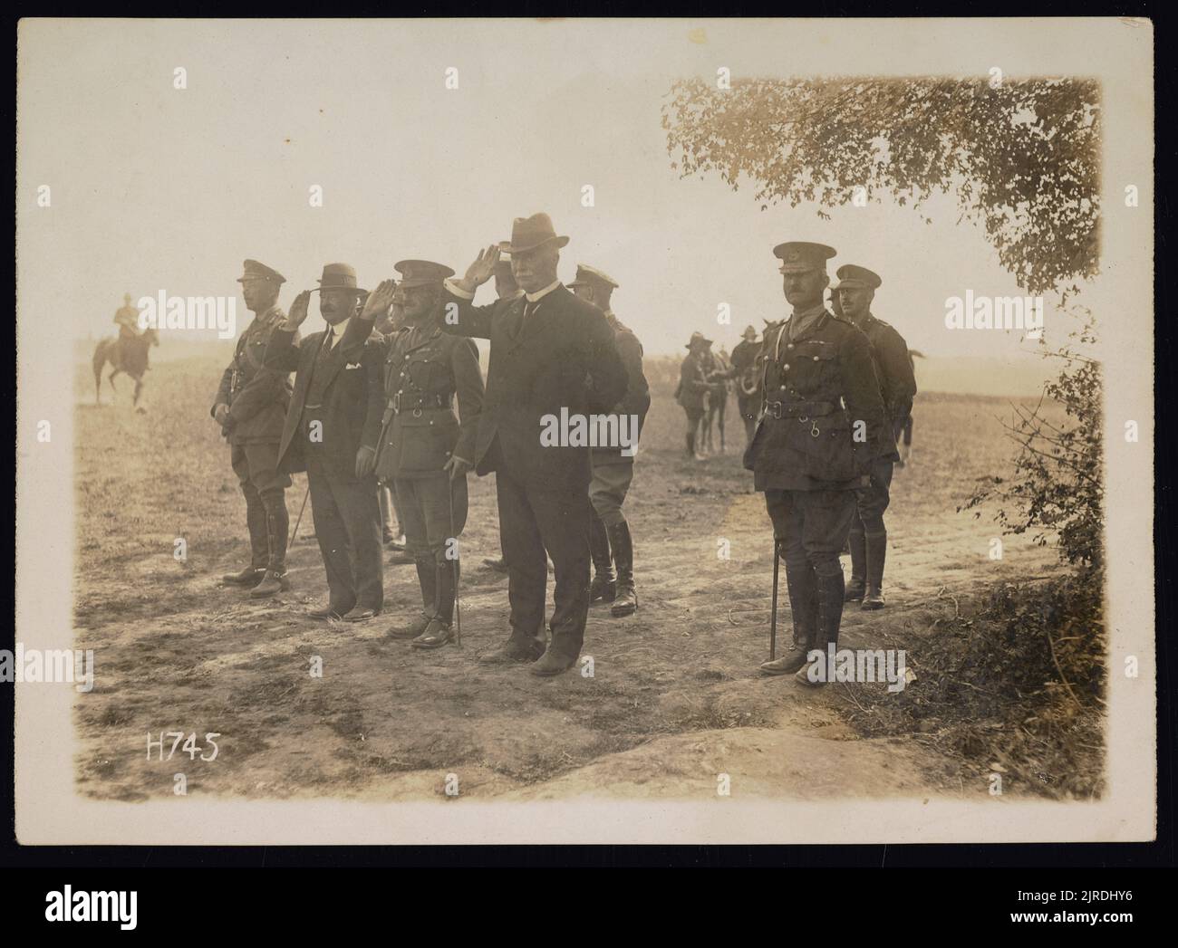 Untitled (men in field), circa 1915, maker unknown Stock Photo - Alamy