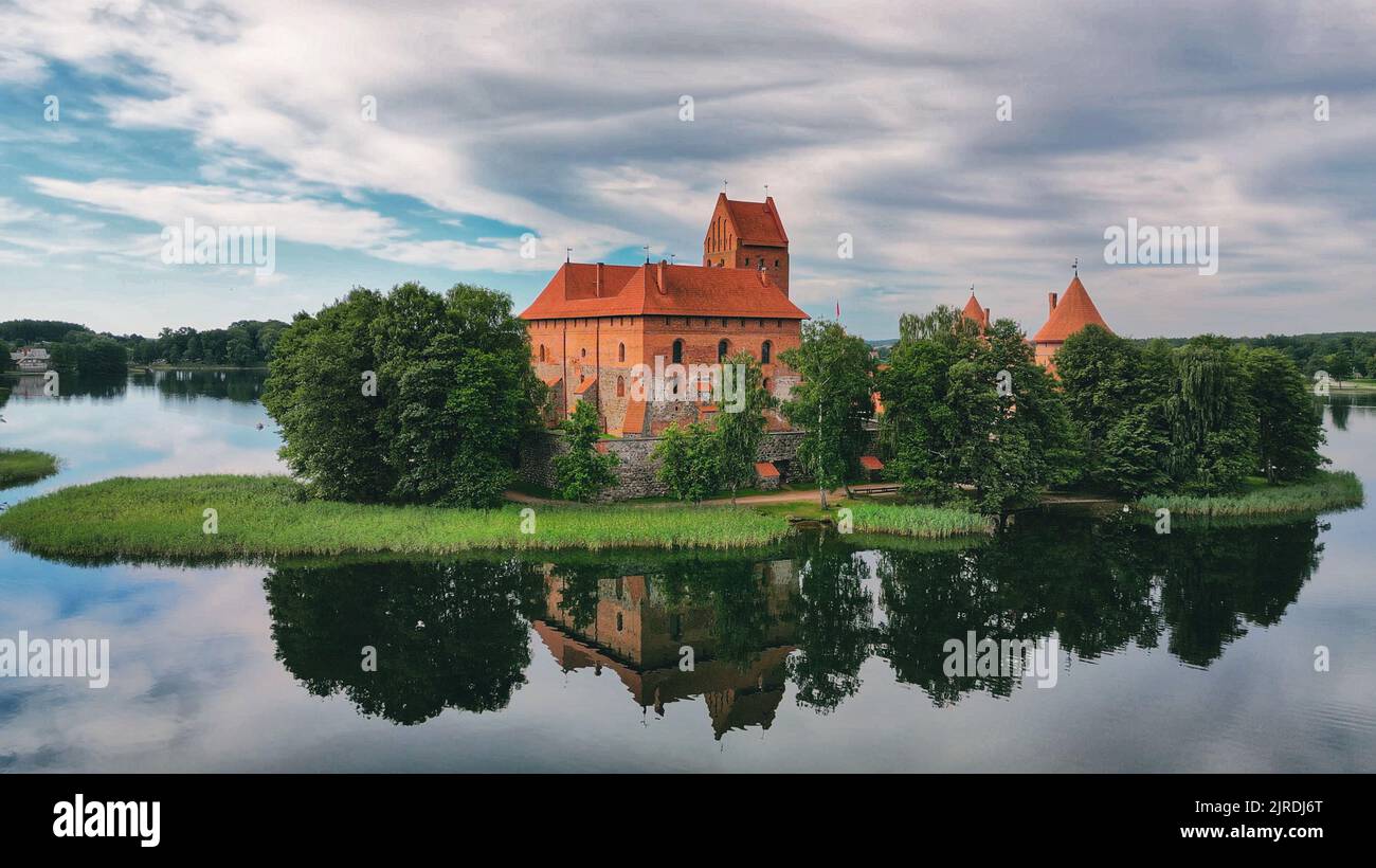 Trakai Island castle on the lake, landmark in Lithuania. Traku salos pilis, historical medieval castle from 14th century. Stock Photo