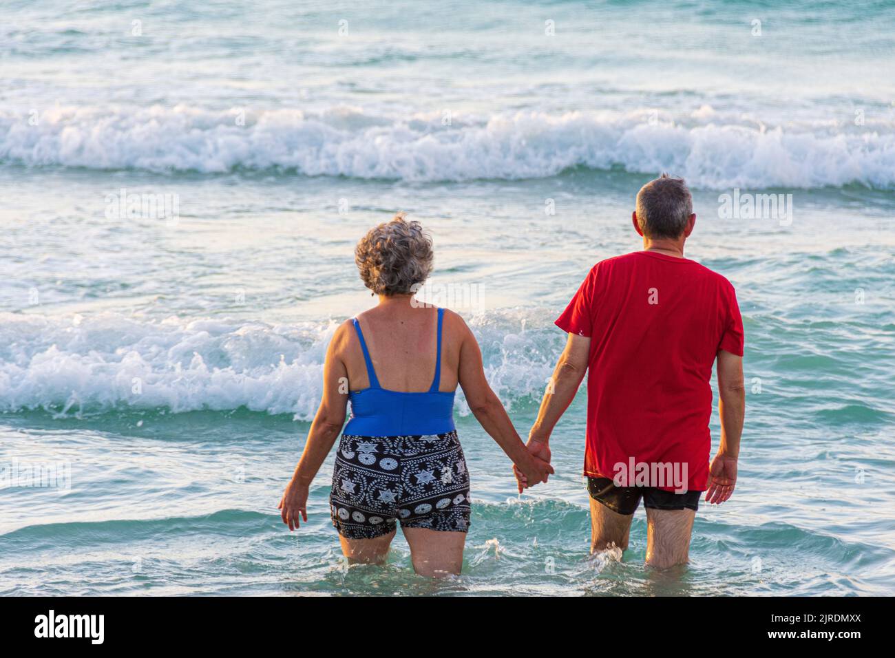 Beach varadero beach turquoise water man wearing red tee shirt hires