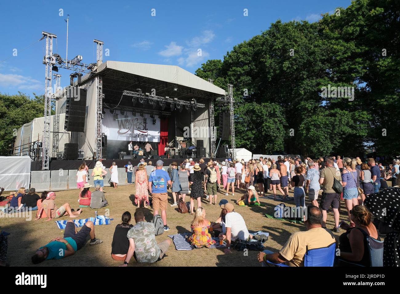 Festival goers await the next main stage act at Weyfest Festival, Rural Life Centre, Tilford, England, UK. August 19, 2022 Stock Photo