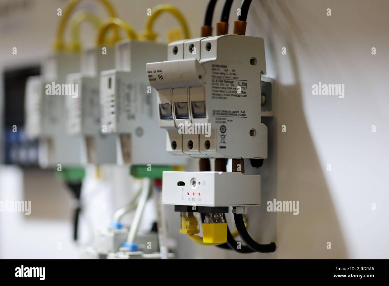 Electrical modular automatic circuit breakers. Selective focus. Stock Photo