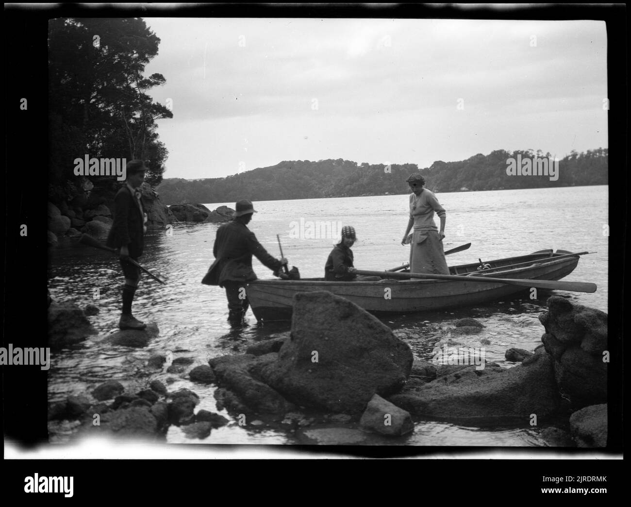 Boarding a dinghy boarding a dinghy Black and White Stock Photos